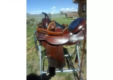 Circle Y saddle size 15.  Full QH bars. Breast collar included.